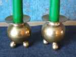 A pair of smaller round vintage copper candlesticks - Image 2