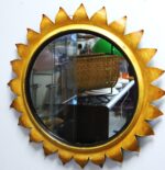 Vintage flower-shaped wall mirror