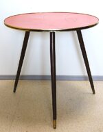 Vintage three-legged round coffee table