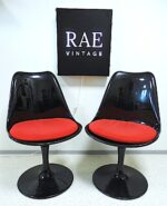A pair of two Eero Saarinen style ''tulip'' chairs