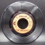 7” single “Watching the news” - Image 3
