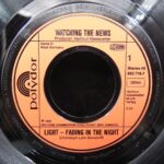 7” single “Watching the news” - Image 4