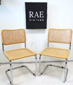 Vintage Bauhaus style icons, a pair of Cesca chairs designed by Marcel Breuer in 1928