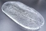 Vintage pressed glass plate from the Humpilan Lasi “Pine Branch” series