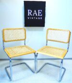 Vintage Bauhaus style icons, a pair of Cesca chairs designed by Marcel Breuer in 1928