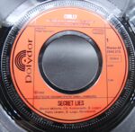 7″ single by CHILLY “Secret Lies” - Image 4